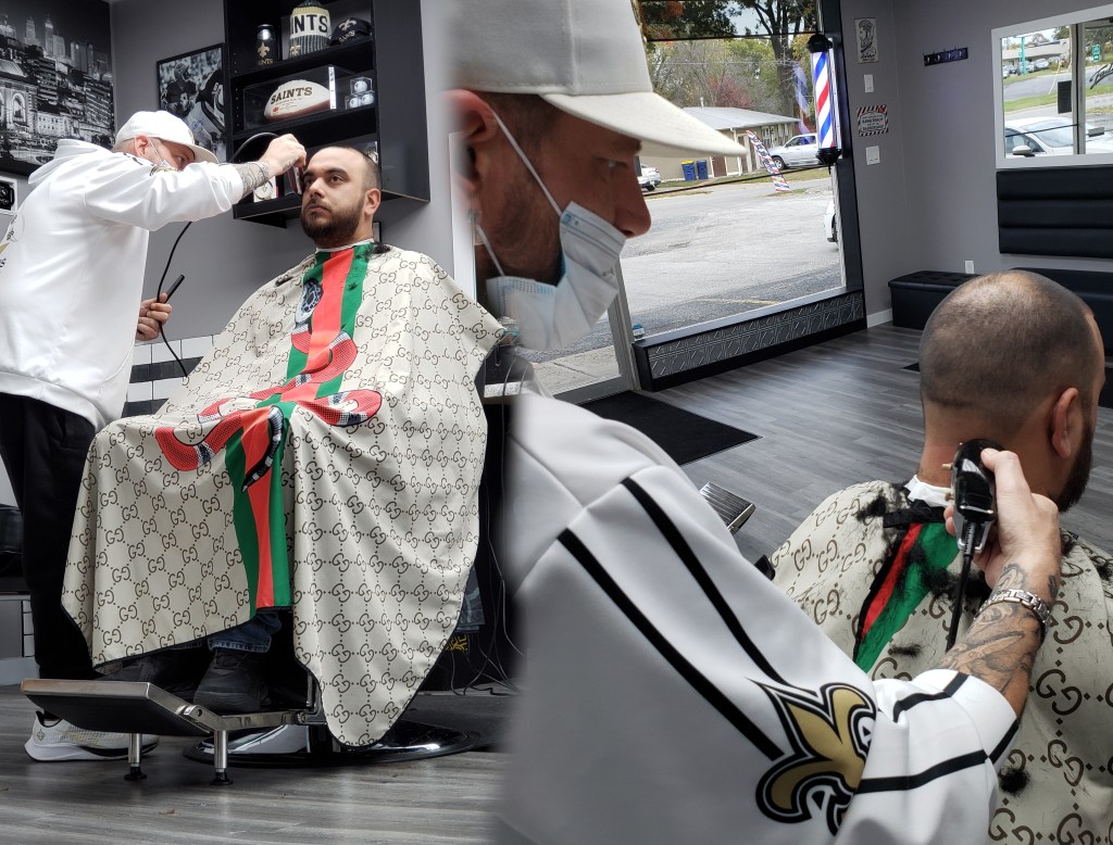 Stylz trimming a client's hair and beard.