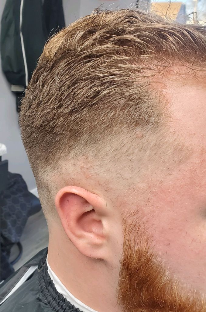 A man's freshly cut hair.